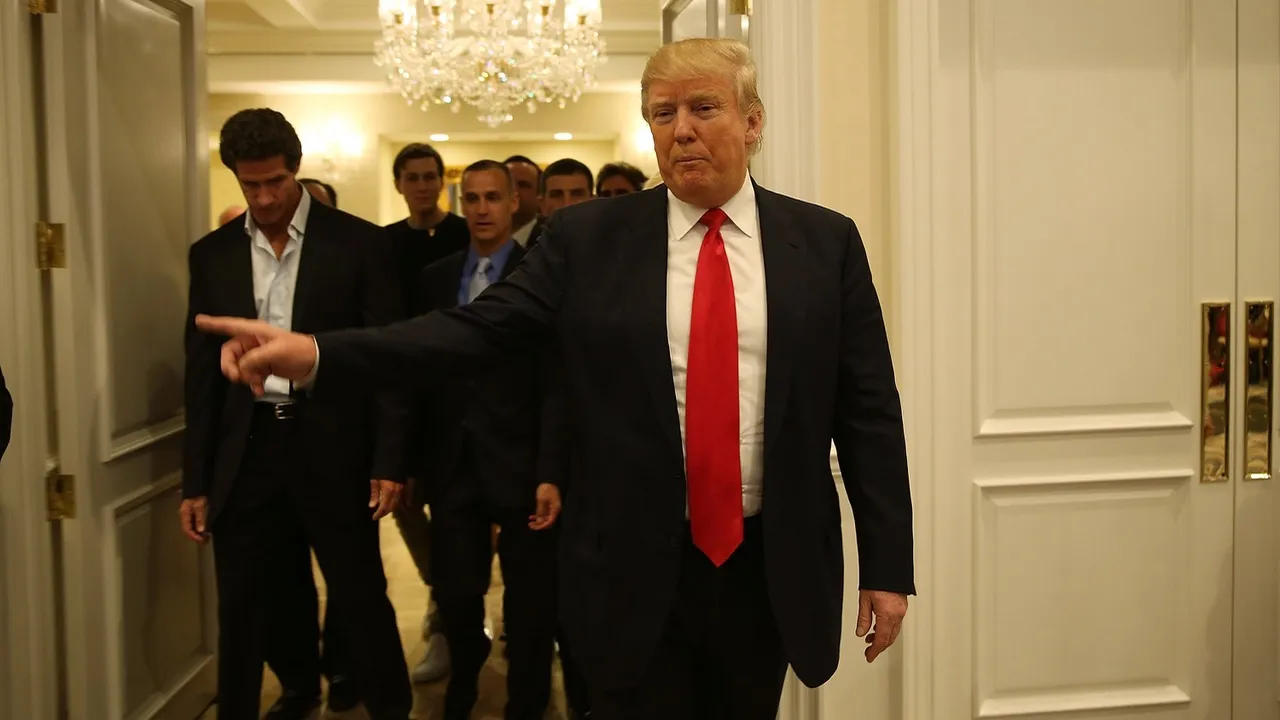 Republican presidential candidate Donald Trump arrives for a press conference at the Trump National Golf Club Jupiter on March 8, 2016, in Jupiter, Florida.
