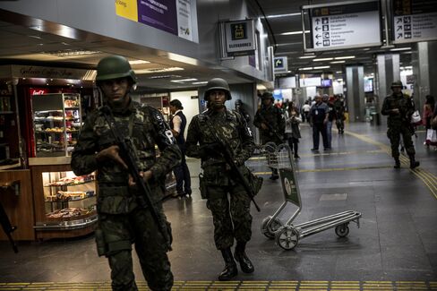 Military soldiers patrol inside Galeao International Airport on July 20.