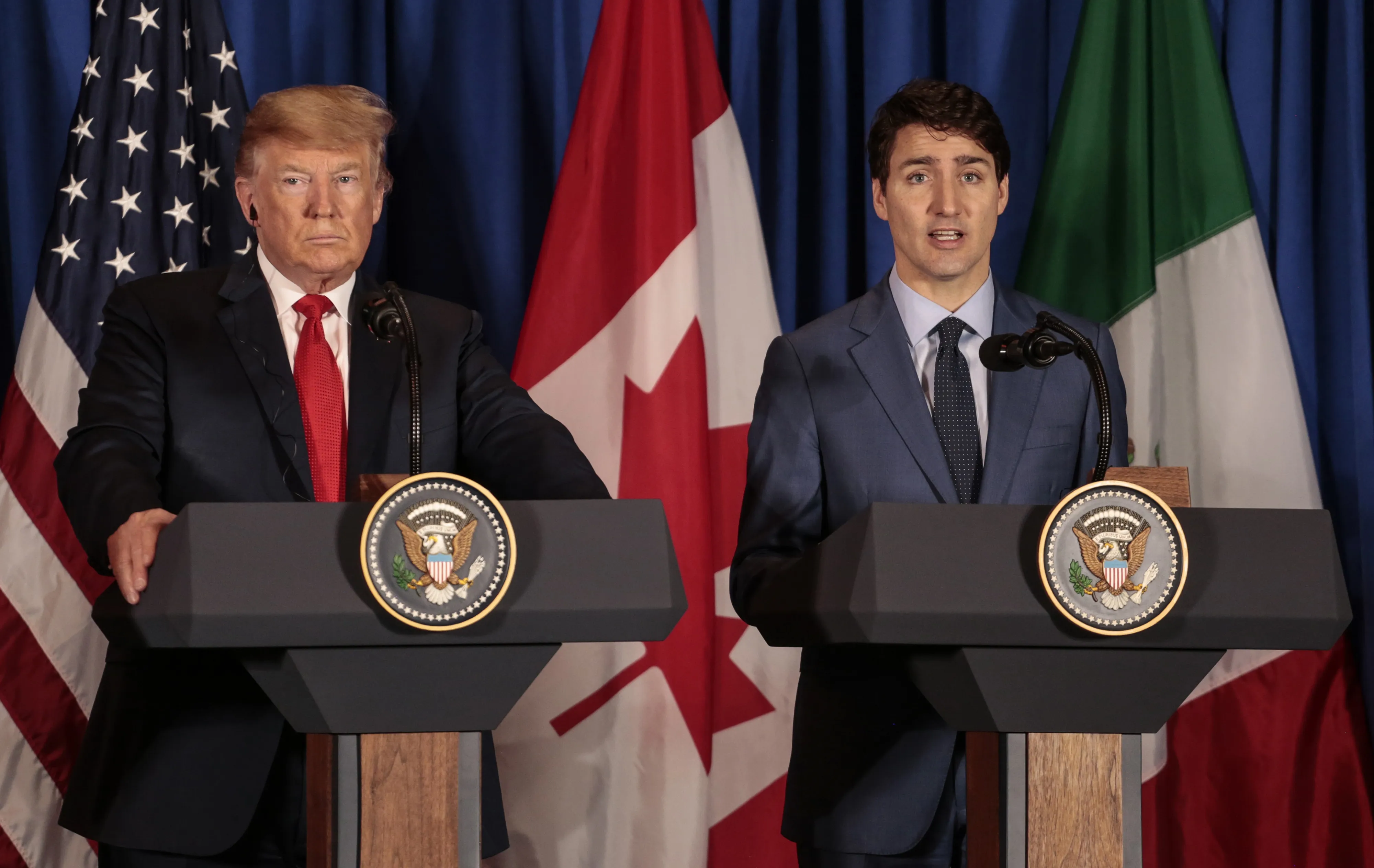 Justin Trudeau, Canada's prime minister, right, and U.S. president Donald Trump&nbsp;before the signing of the United States-Mexico-Canada Agreement.