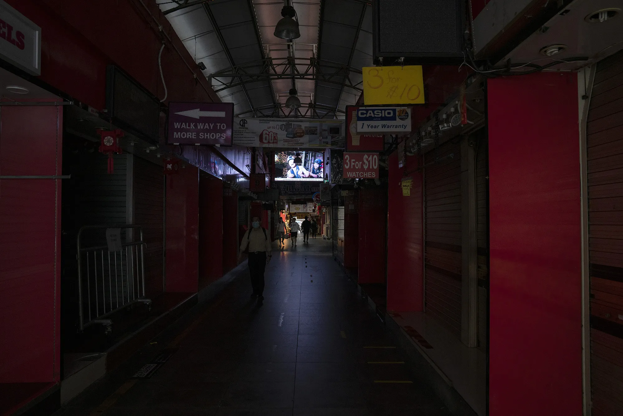 Stores stand closed in the Bugis area during a partial lockdown imposed due to the coronavirus in Singapore on&nbsp;April 7