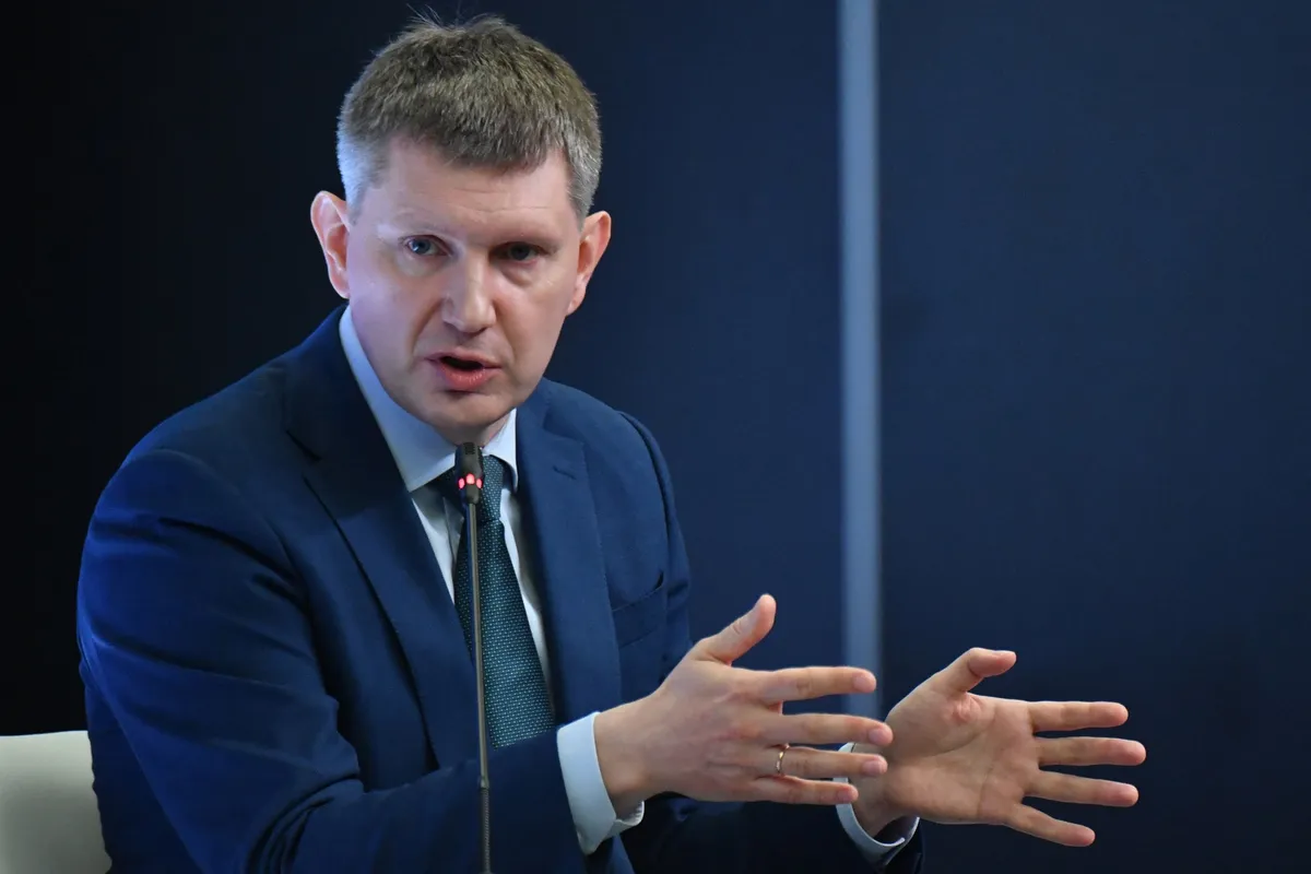 Maxim Reshetnikov during a conference.
