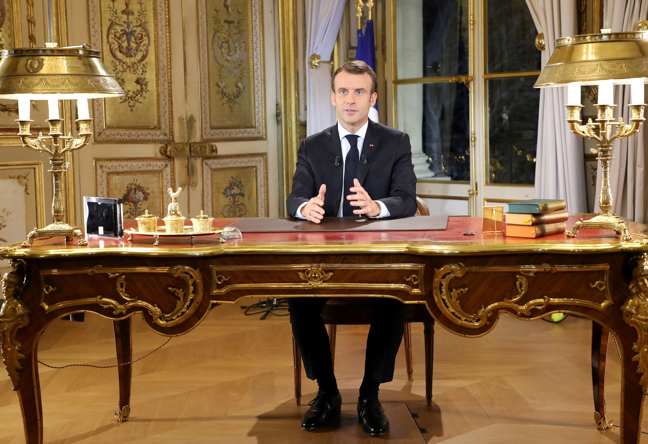 Emmanuel Macron speaks during a special address to the nation on Dec. 10.