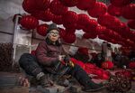 A Chinese worker makes lanterns at a local factory in Hebei province, China.