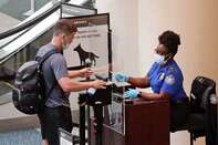 relates to With No Mask Rules, TSA Balances Security With Virus Risk