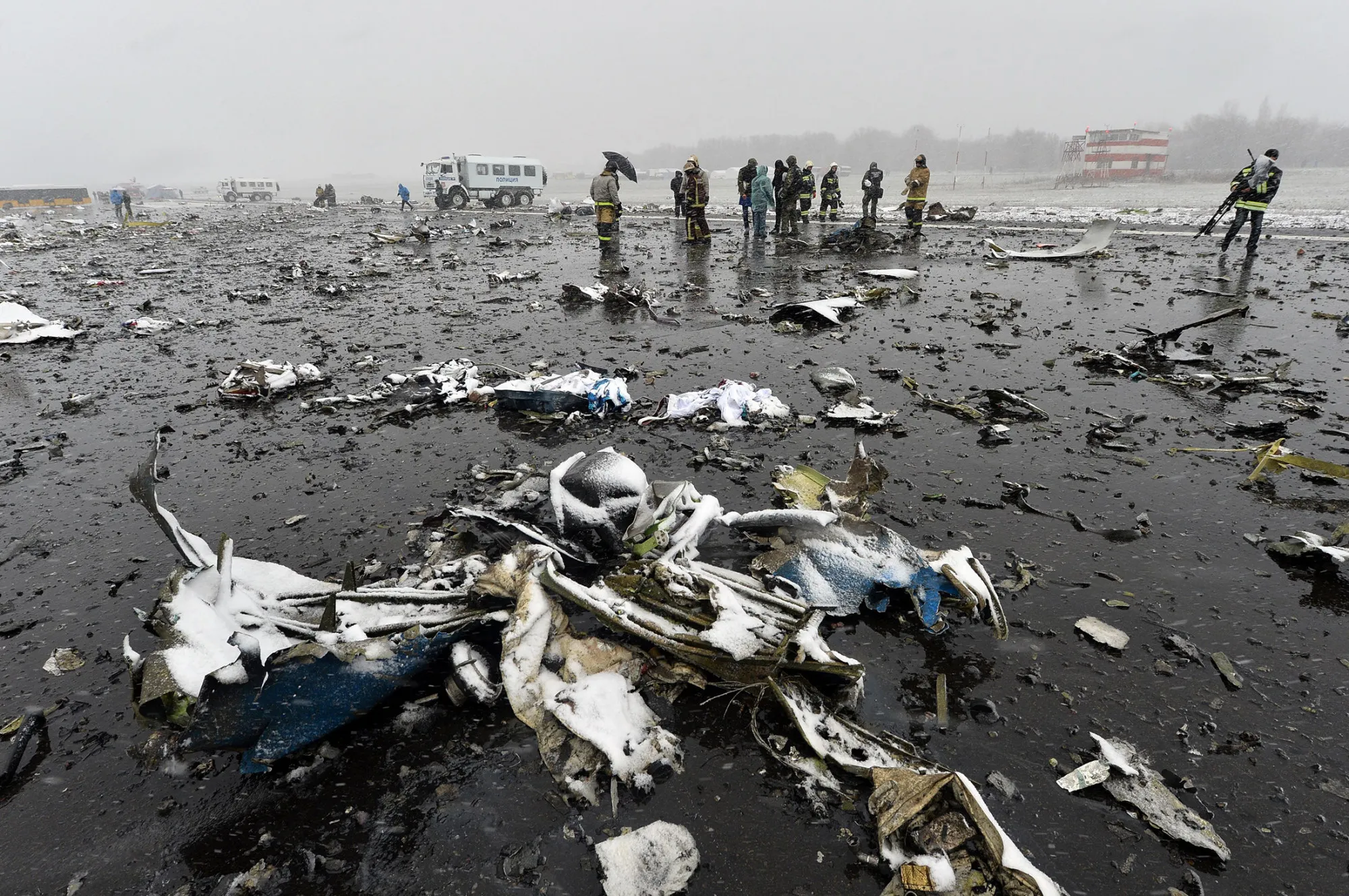 Russian emergency rescuers and forensic investigators work on the wreckage of the FlyDubai passenger jet in the city of Rostov-on-Don on March 19, 2016.
