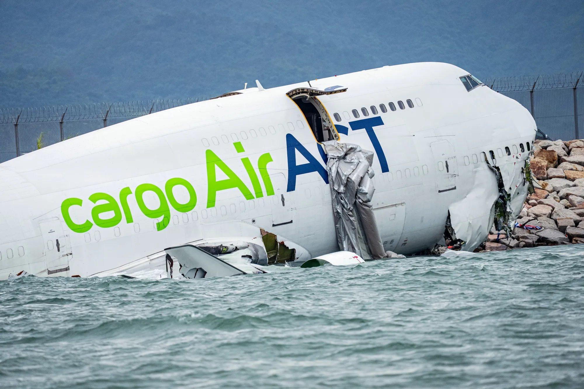 Two Dead After Cargo Jet Skids Into the Sea at Hong Kong Airport