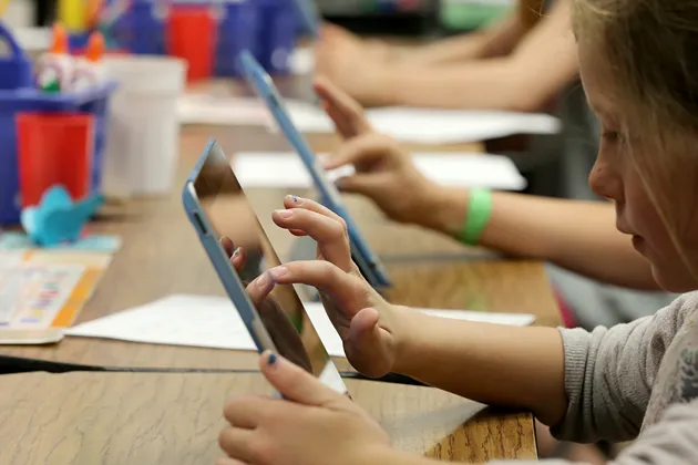 Second graders work on Apple iPads as part of their classroom work at Park Lane Elementary school in Sandy, Utah on May 20