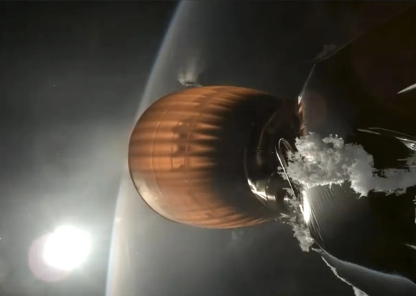 Image from video provided by SpaceX shows the upper stage engine of a&nbsp;Falcon 9 rocket that&nbsp;malfunctioned on July 11, leaving satellites in a precariously low orbit.