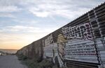 A mural depicts Donald Trump on the U.S.-Mexico border fence in Tijuana, northwestern Mexico.
