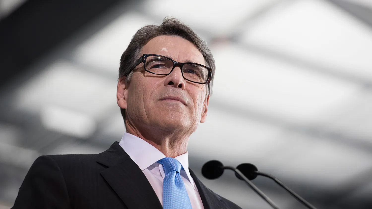 Rick Perry, former governor of Texas, speaks during an event to formally announce his presidential campaign in a hangar at Addison Airport in Addison, Texas, U.S., on Thursday, June 4, 2015.
