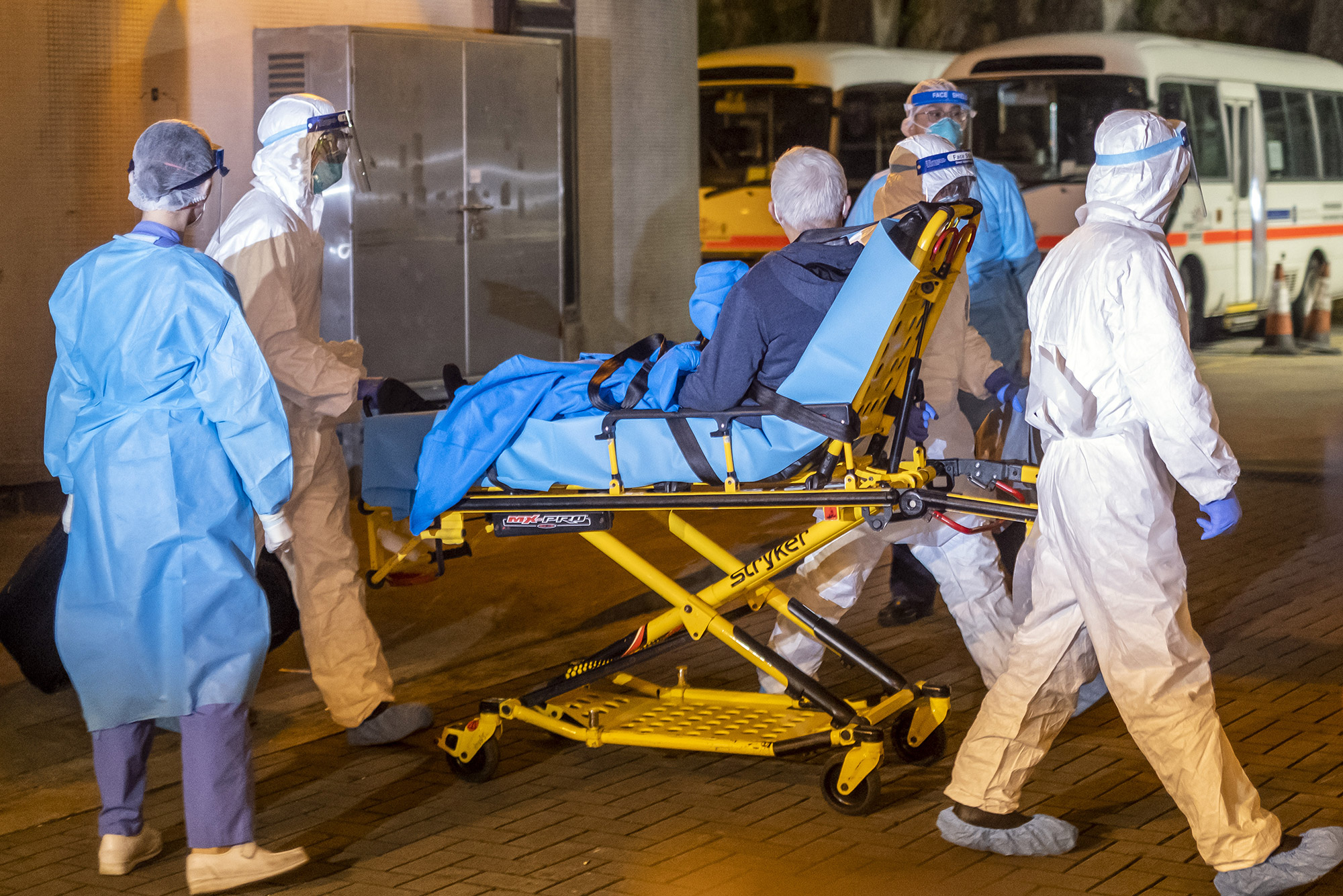 Medical workers&nbsp;transport a patient believed to have&nbsp;coronavirus&nbsp;in Hong Kong, China.&nbsp;