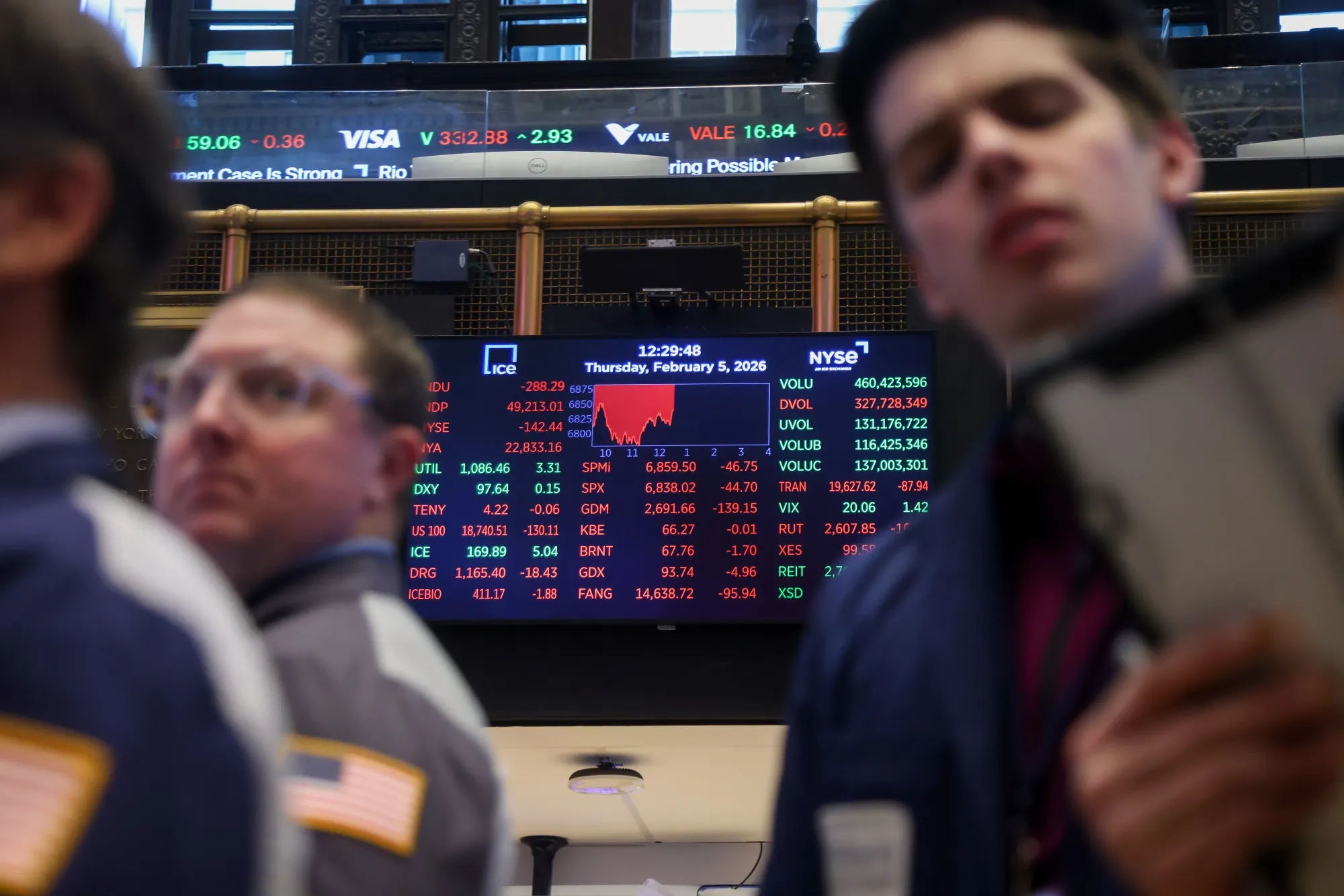 Market information as traders work on the floor of the New York Stock Exchange&nbsp;on Feb. 5.&nbsp;