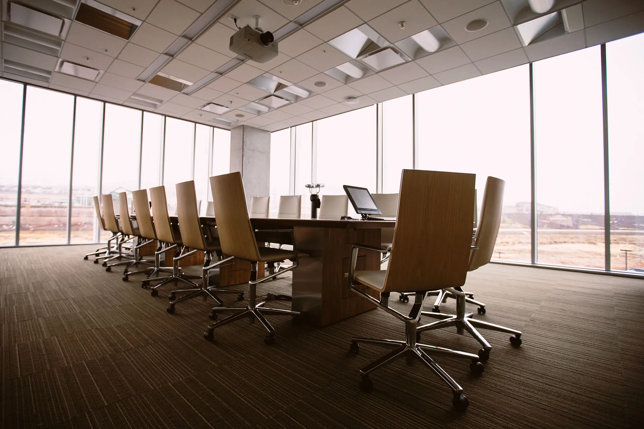 conference room with chairs and windows