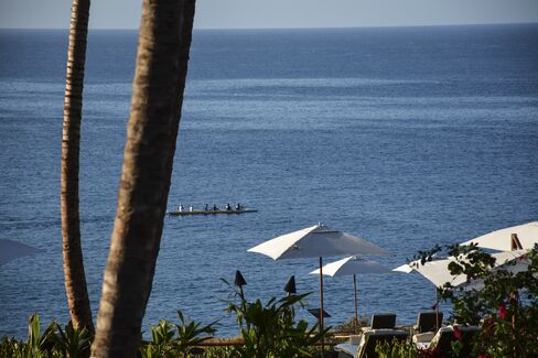 Traditional Hawaiian outriggers are the only water craft allowed on the protected Hulopo'e Bay in front of the Four Seasons Resort Lanai.