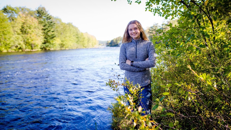 Environmentalist Stella Bowles stands beside the LaHave River in Nova Scotia.