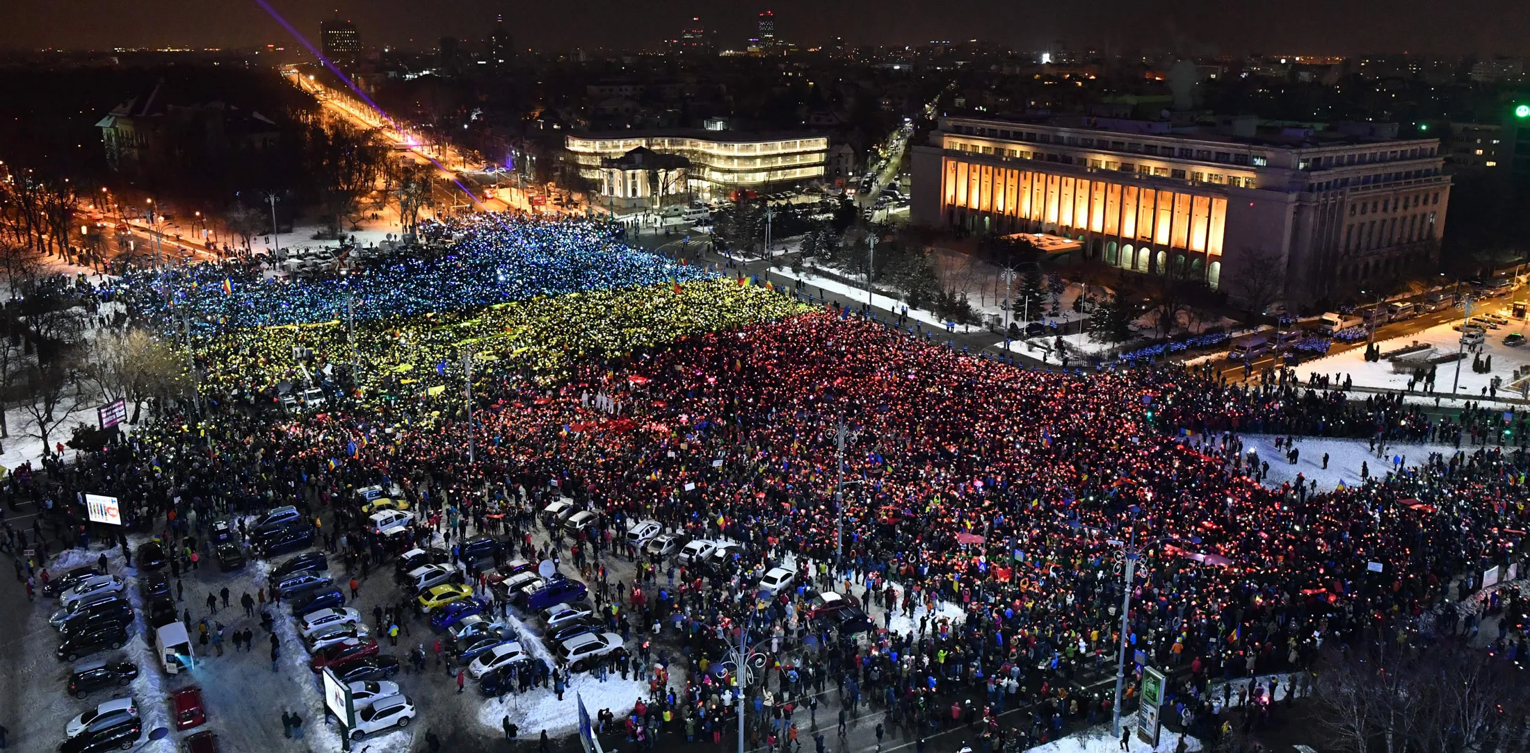 People protest in front of the government headquarters in Bucharest on Feb. 12, 2017.
