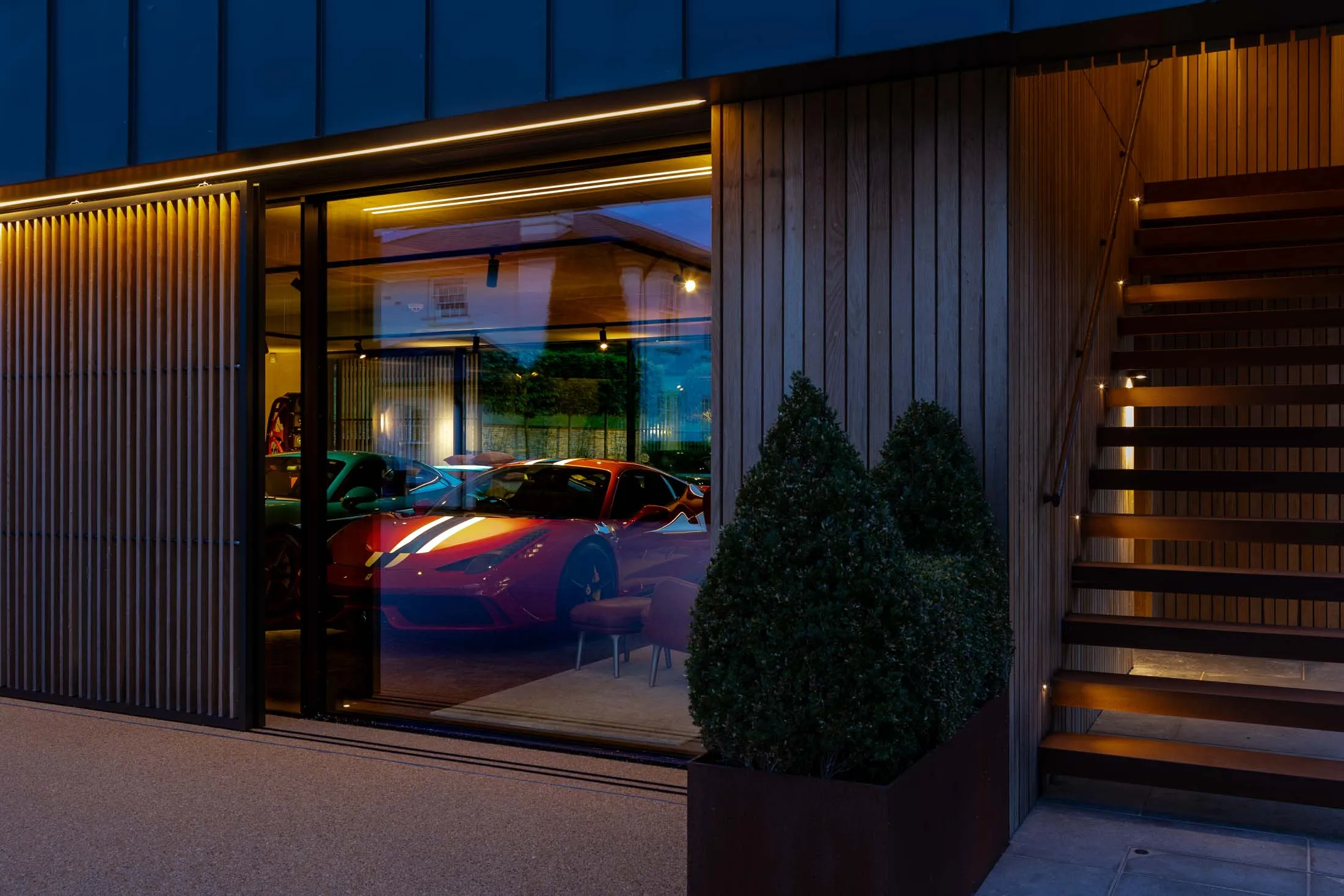 A car gallery in England’s Cotswolds has also been imagined as a hangout space.