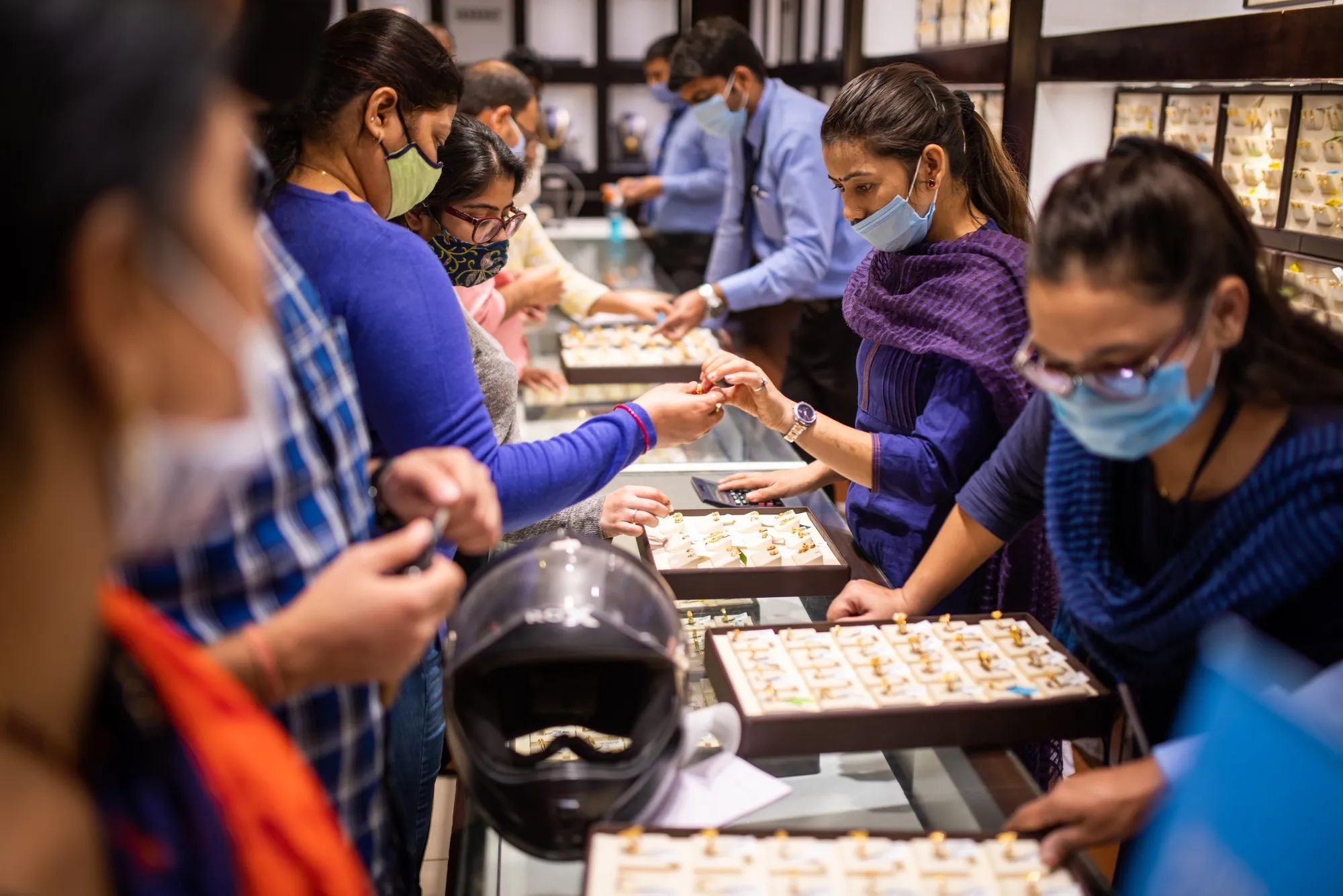 Customers shop for gold during the festival of Dhanteras in Noida, in Nov. 2020.