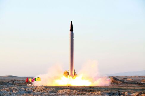 This picture released by the official website of the Iranian Defense Ministry claims to show the launching of an Emad long-range ballistic surface-to-surface missile in an undisclosed location.