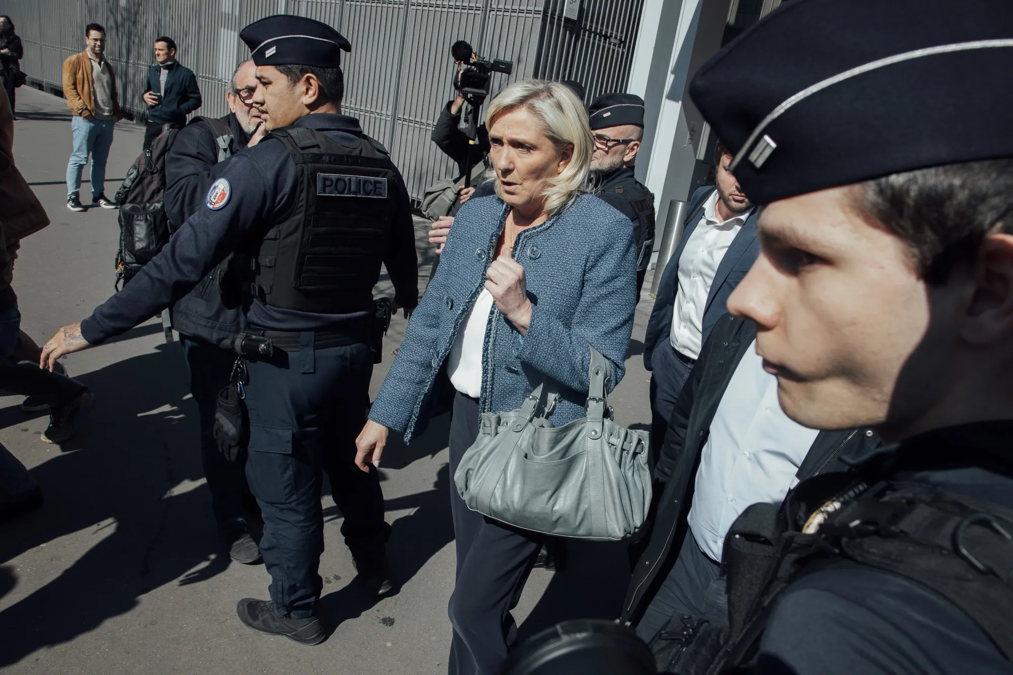 Marine Le Pen leaves court in Paris, on March 31.