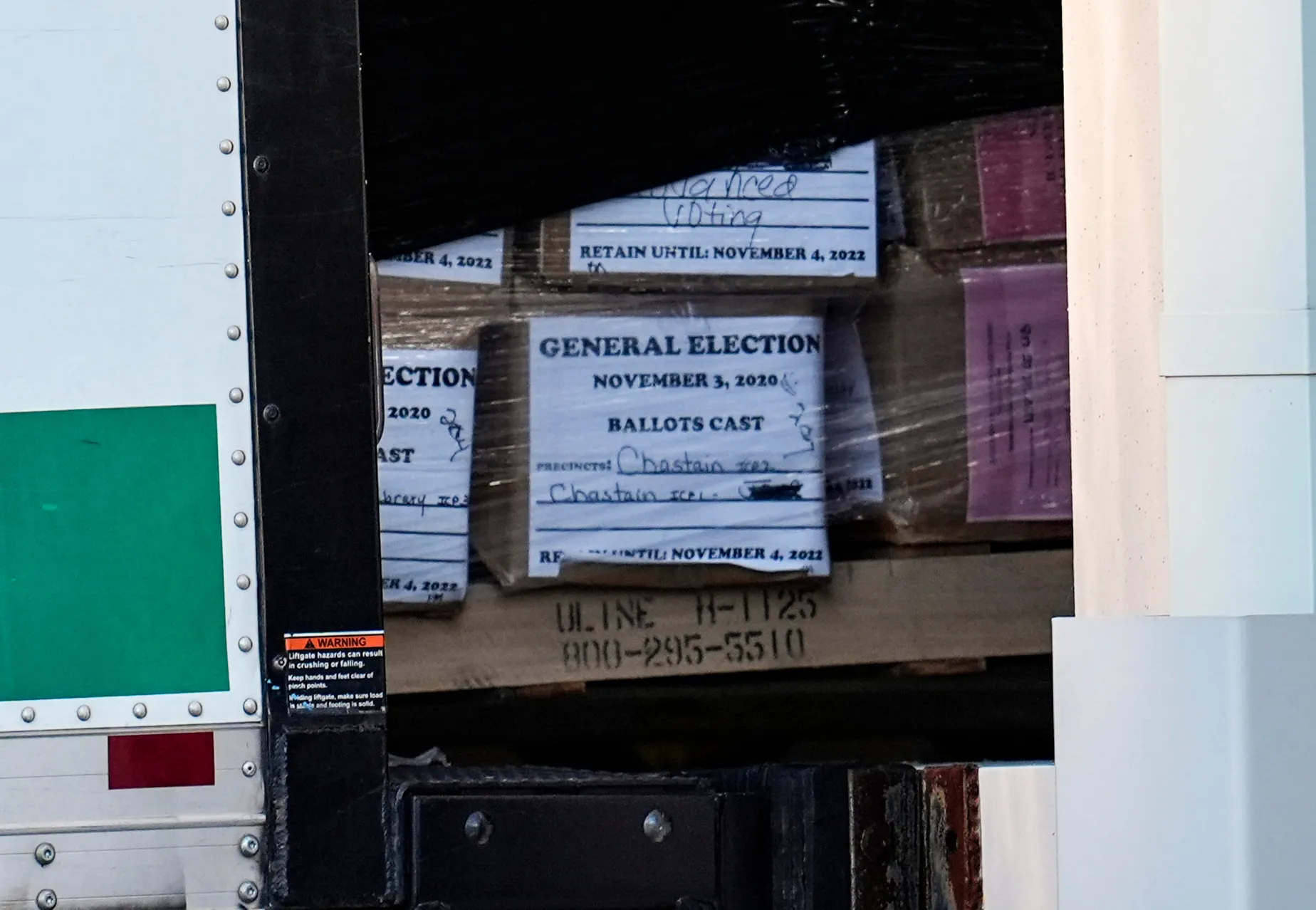 Georgia General Election 2020 ballots are loaded by the FBI onto trucks at the Fulton County Election HUB on Jan. 28 in Union City, Georgia.