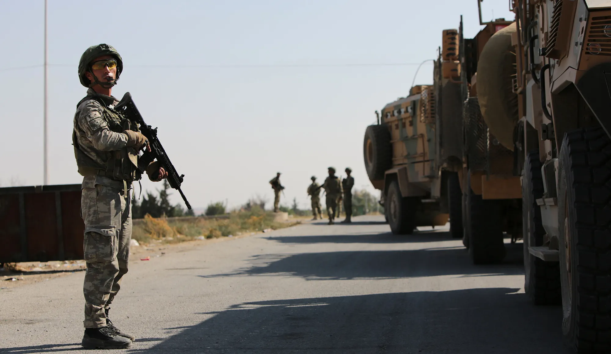 Turkish soldiers patrol the northern Syrian Kurdish town of Tal Abyad, on the border between Syria and Turkey, on Oct. 23.