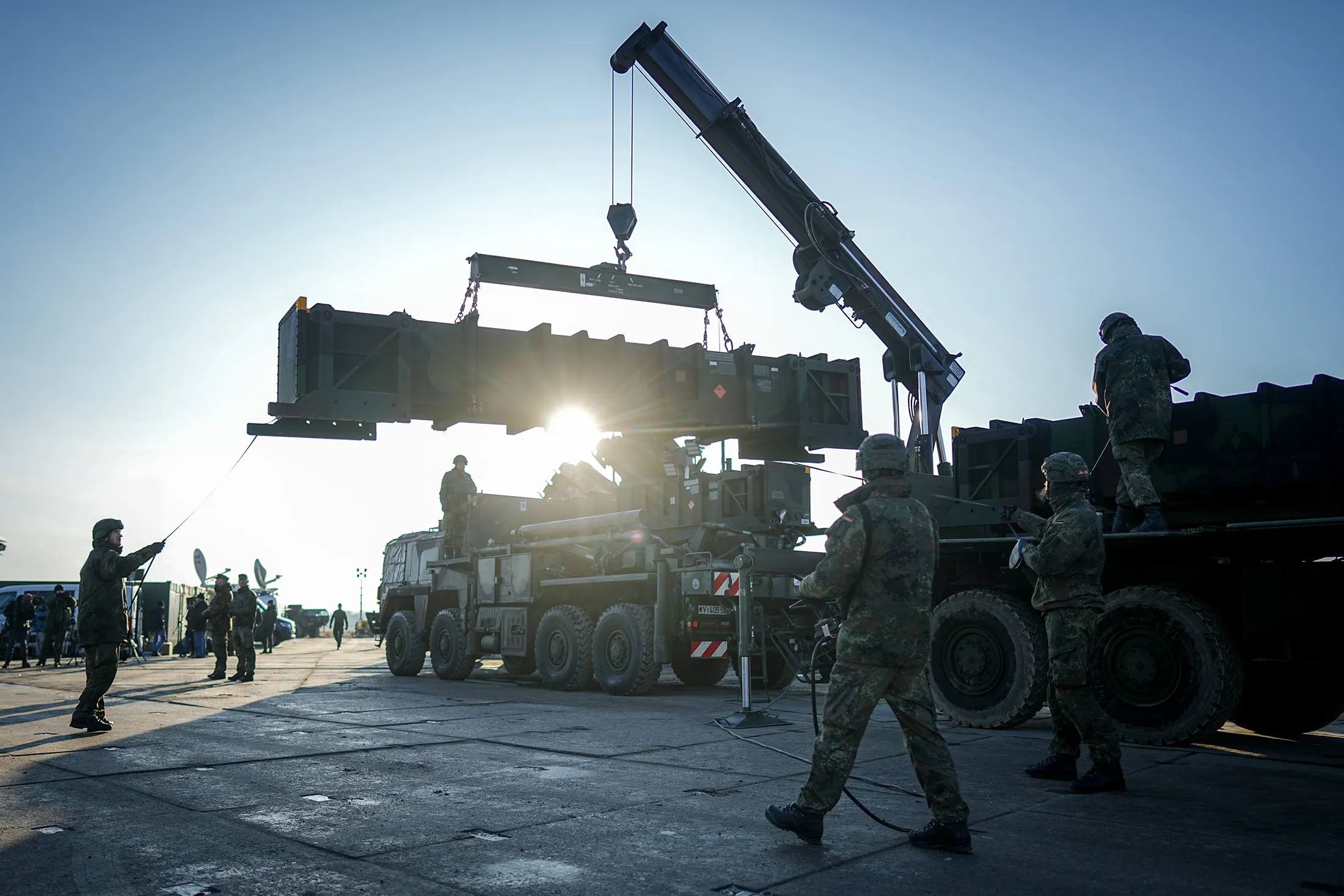 Soldiers load missiles for a Patriot air defense system. With two Patriot systems in Poland, Rzeszow, on Jan. 23.