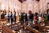 Sri Lankan security personnel walk through debris following an explosion in St Sebastian's Church in Negombo, north of the capital Colombo, on April 21, 2019. - A series of eight devastating bomb blasts ripped through high-end hotels and churches holding Easter services in Sri Lanka on April 21, killing nearly 160 people, including dozens of foreigners. (Photo by STR / AFP) (Photo credit should read STR/AFP/Getty Images)