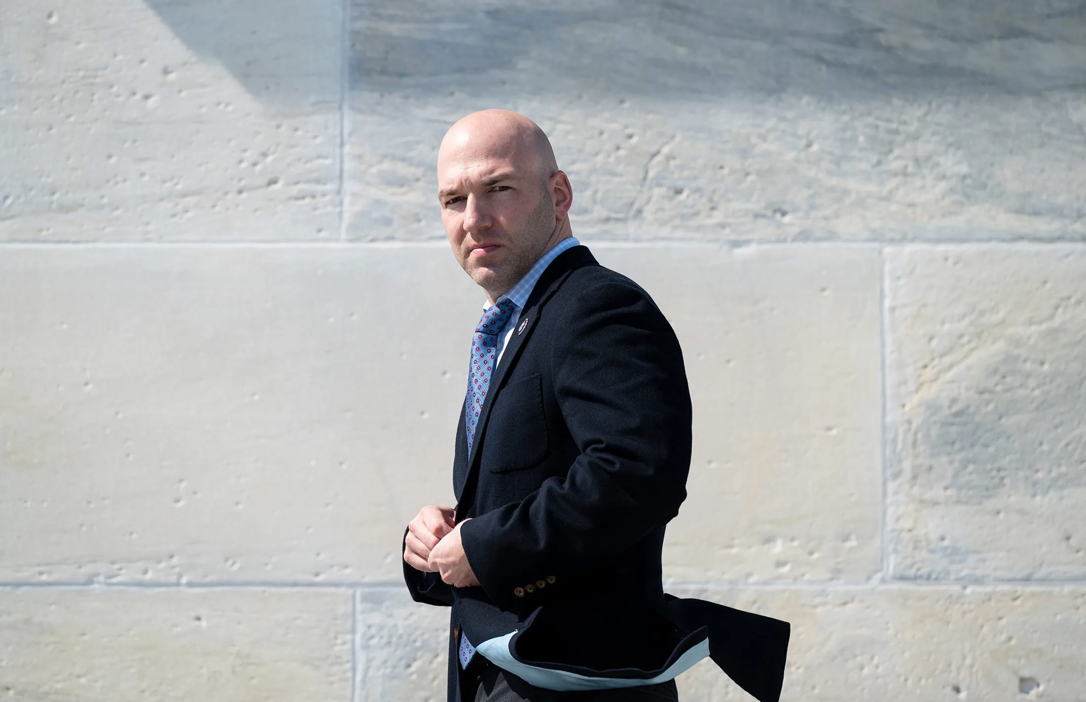 Representative Anthony Gonzalez (R-Ohio) walks down the House steps after a vote on March 11.