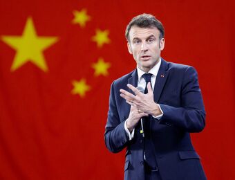 relates to France’s Macron Calls For Reset of Economic Ties With China