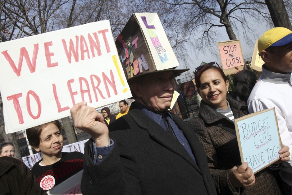 Immigrants protest budget cuts for English language training programs in New York.