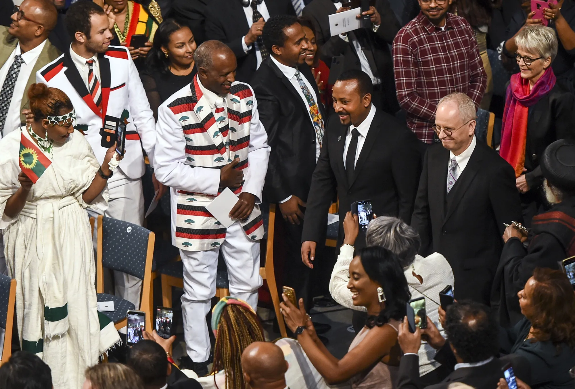 Abiy Ahmed Ali, center, arrives for the Nobel Peace Prize ceremony in Oslo on Dec. 10.