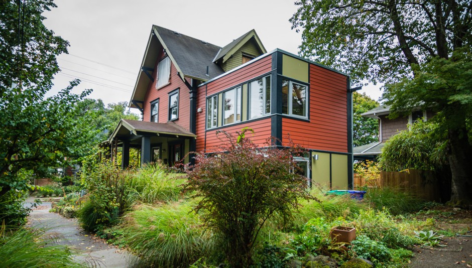 A small accessory dwelling unit—known as an ADU—is attached to an older single-family home in a Portland, Oregon, neighborhood.