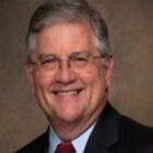 Headshot of Hon Rex Davis