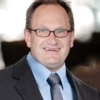 Headshot of Jon Kessler