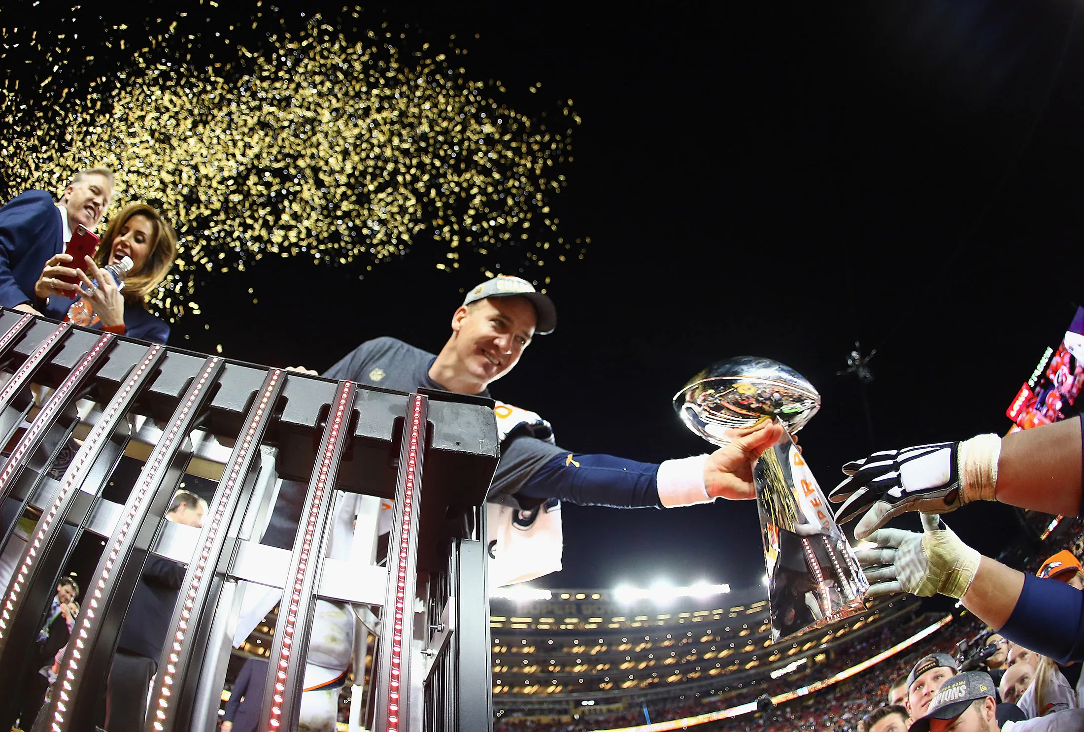 SANTA CLARA, CA - FEBRUARY 07: Peyton Manning #18 of the Denver Broncos holds the Vince Lombardi Trophy following during Super Bowl 50 against the Carolina Panthers at Levi's Stadium on February 7, 2016 in Santa Clara, California.

