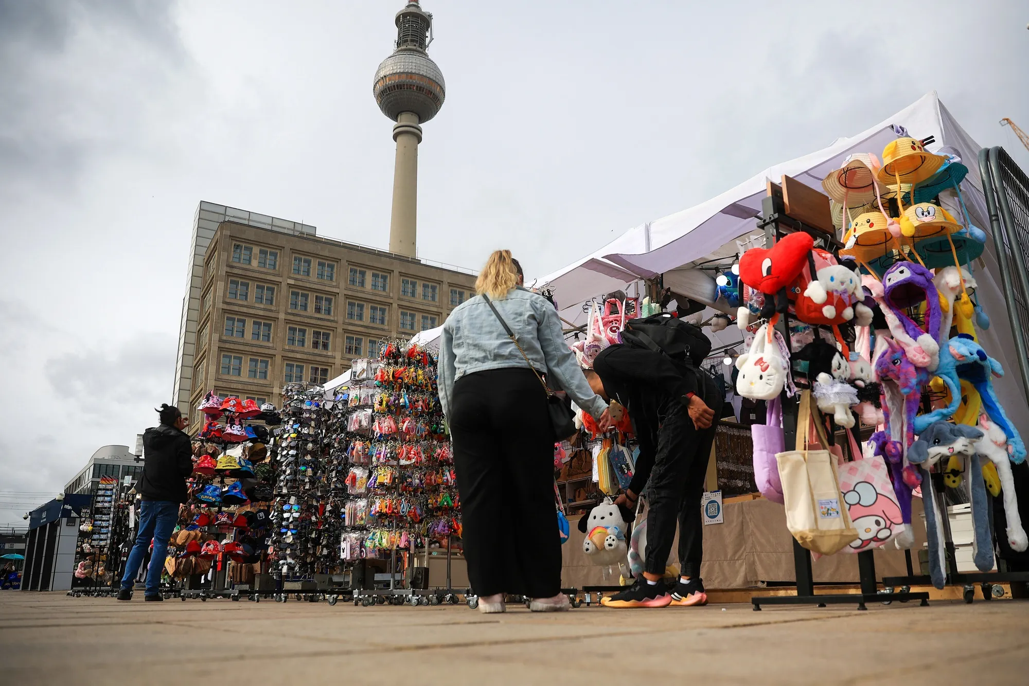 Shoppers at a street market at the Alexanderplatz in Berlin, Germany.