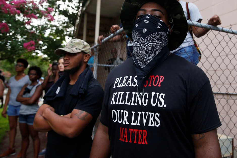 A demonstrator stands during protests in Baton Rouge, Louisiana.