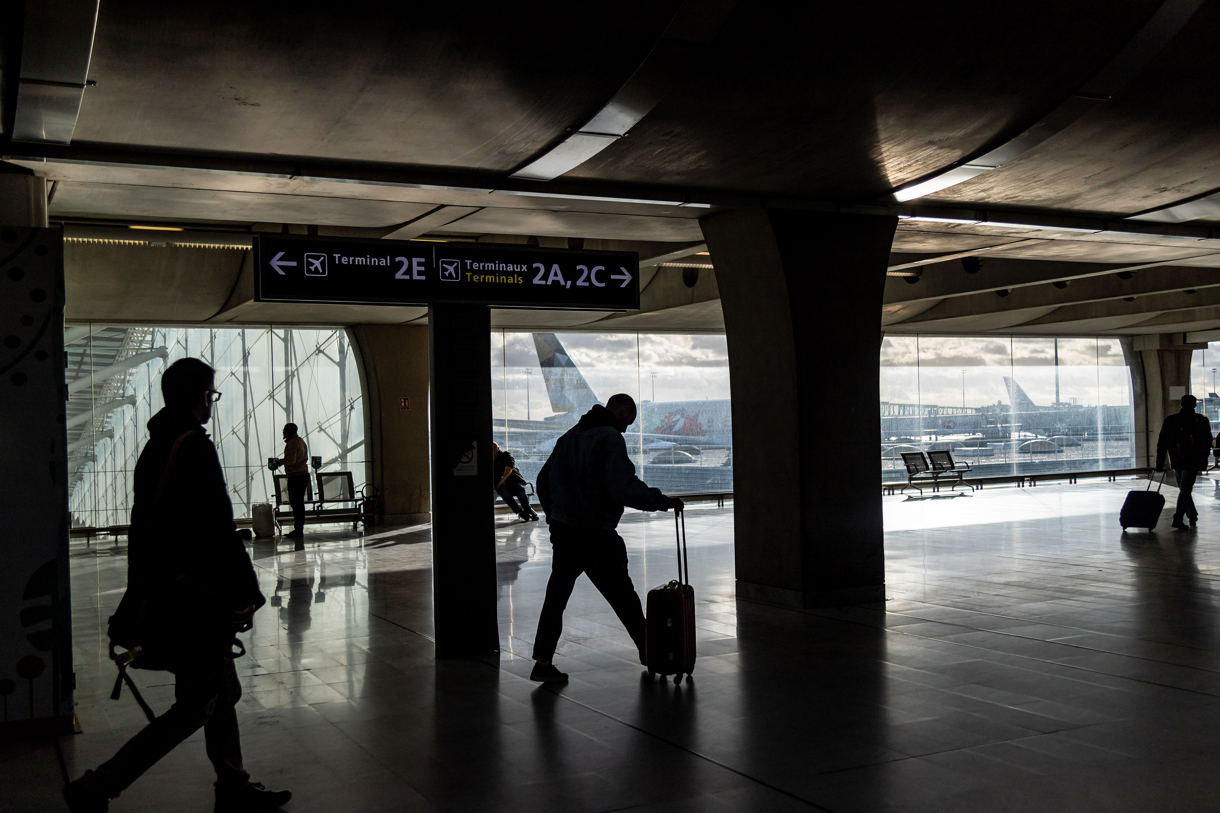 Travelers at Charles de Gaulle airport near Paris, on Jan. 29.