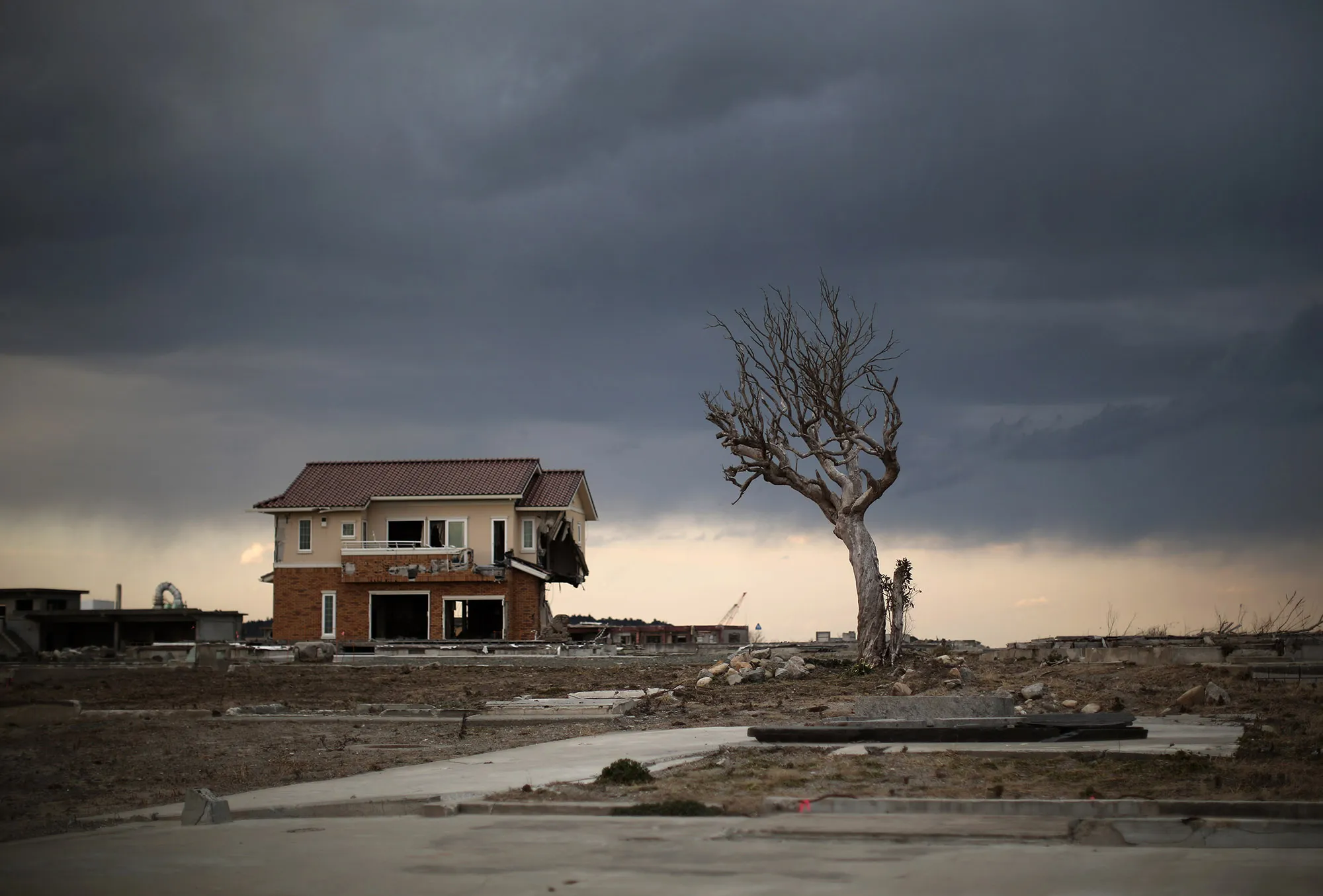 A lone house son the scarred landscape inside the exclusion zone&nbsp;in Namie, Fukushima Japan.&nbsp;