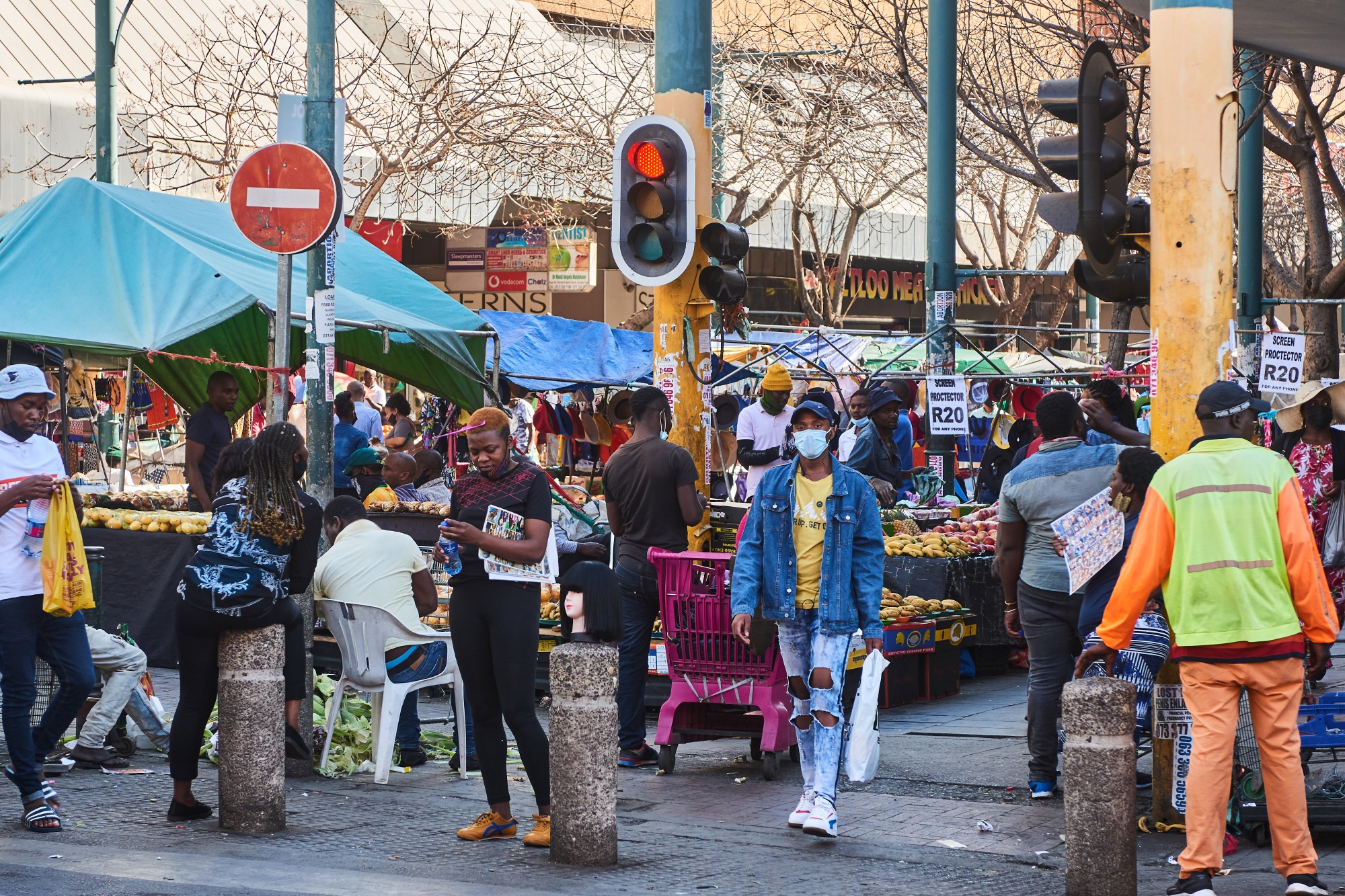 Shoppers walk through a market in&nbsp;Pretoria, South Africa.