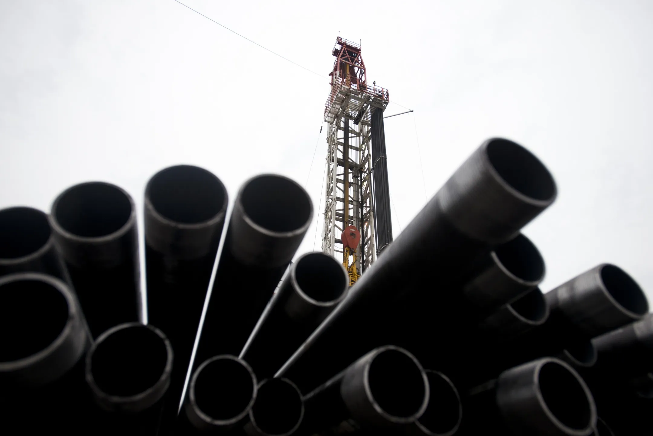 Threaded drilling pipes are stacked at a hydraulic fracturing site owned by EQT Corp.