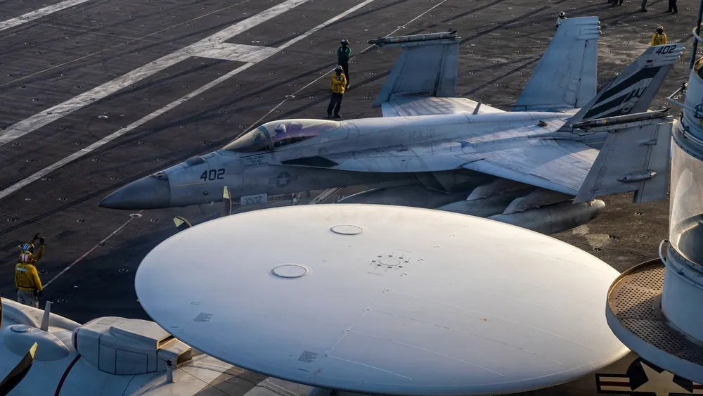 A US Navy F/A-18E Super Hornet on the flight deck of USS Abraham Lincoln, on March 16.