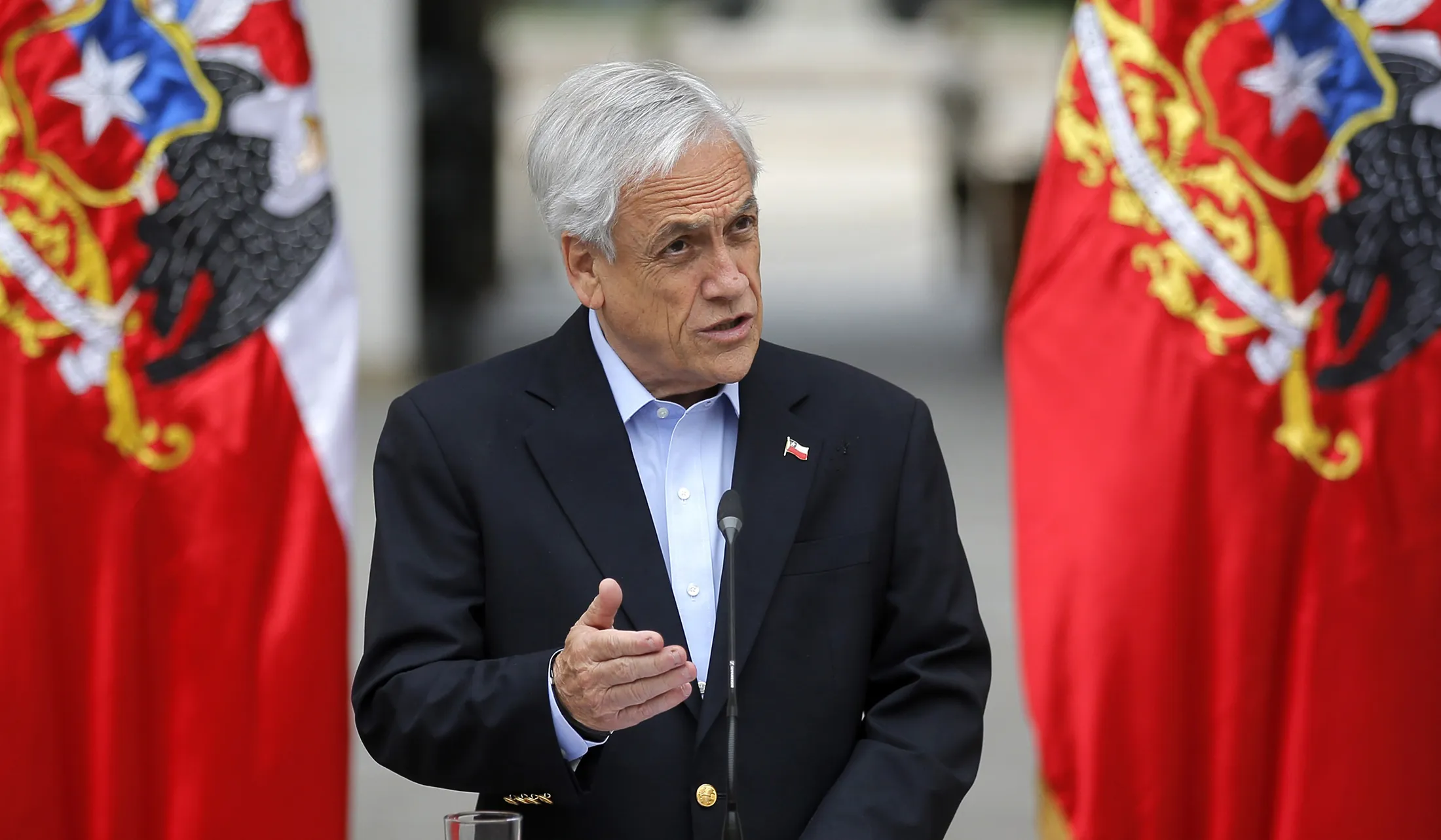 Sebastian Pinera addresses the nation in Santiago, on Oct. 26.