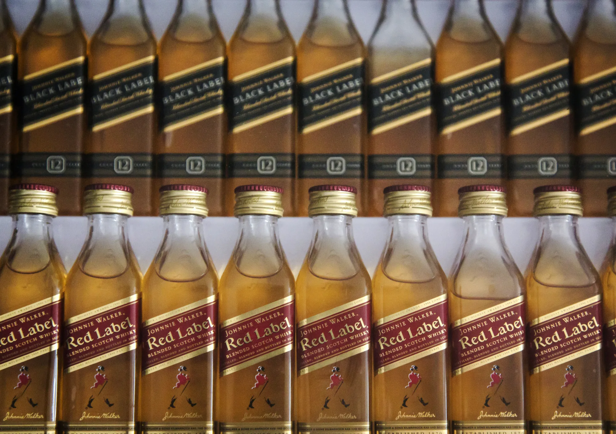 Miniature bottles of Johnnie Walker Red Label whiskey.