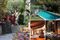 Clockwise from left: a scenic patio; the pool; food is sourced from the on-site organic garden; a spot for meditation.