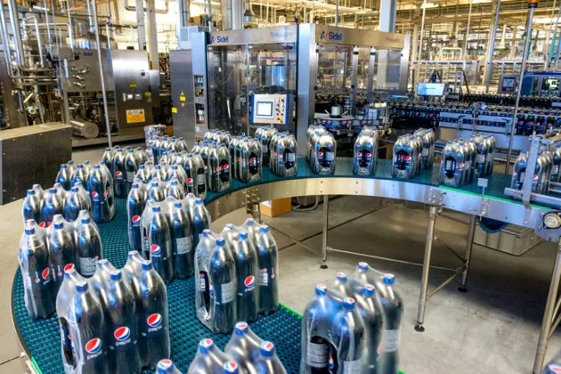 Bottles of Pepsi are packaged for shipping on the production line at PepsiCo’s Sandora beverage plant in Mykolayiv, Ukraine, in September 2012
