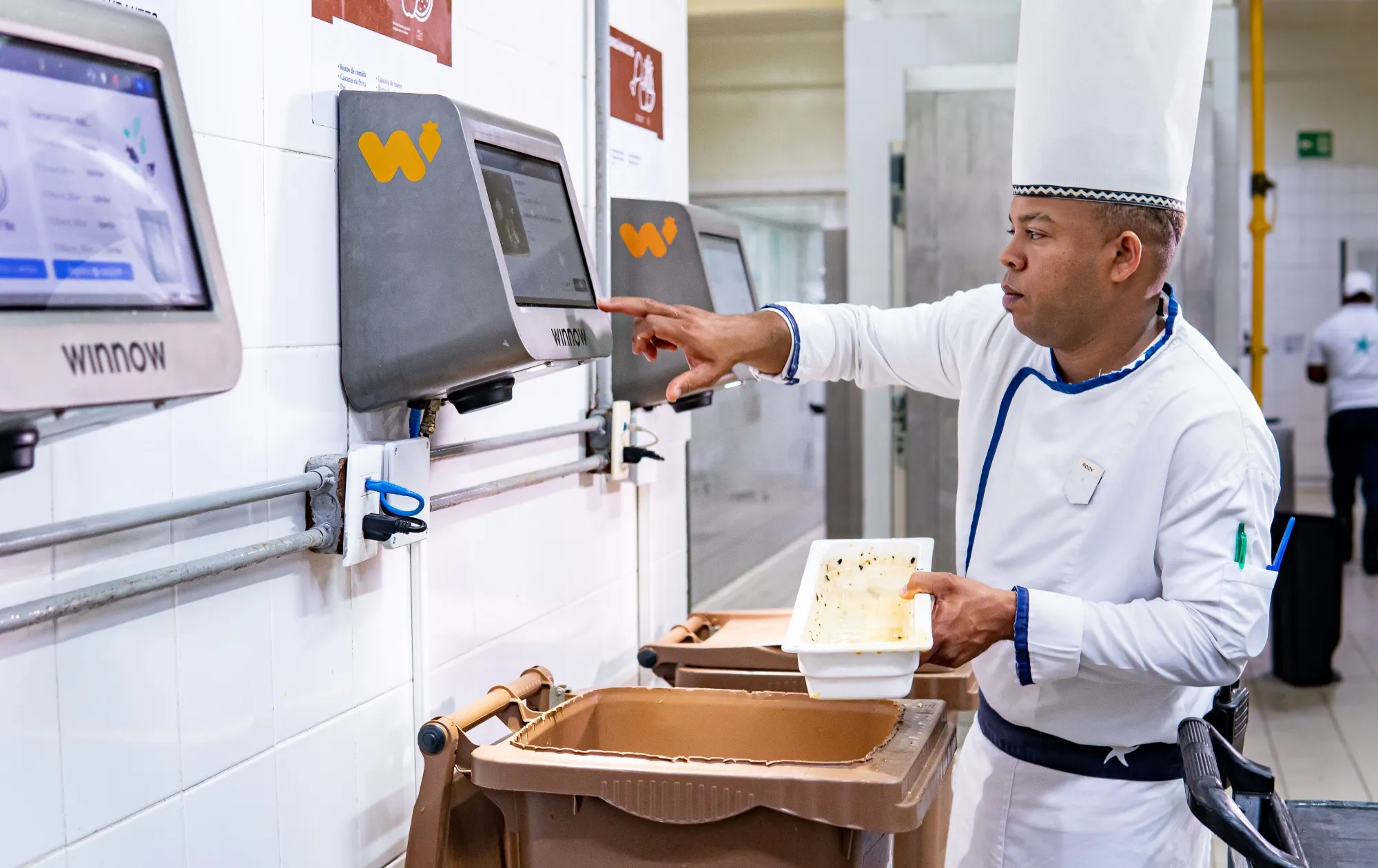 Chef selects details of discarded food on Winnow’s waste tracker.