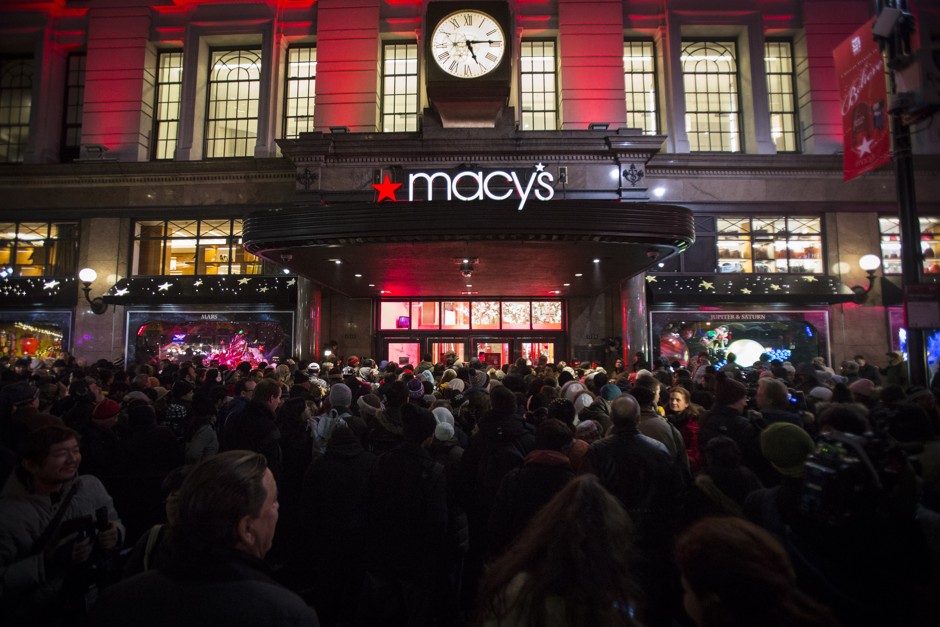 Shoppers wait outside a New York Macy's for the store's Black Friday opening. 
