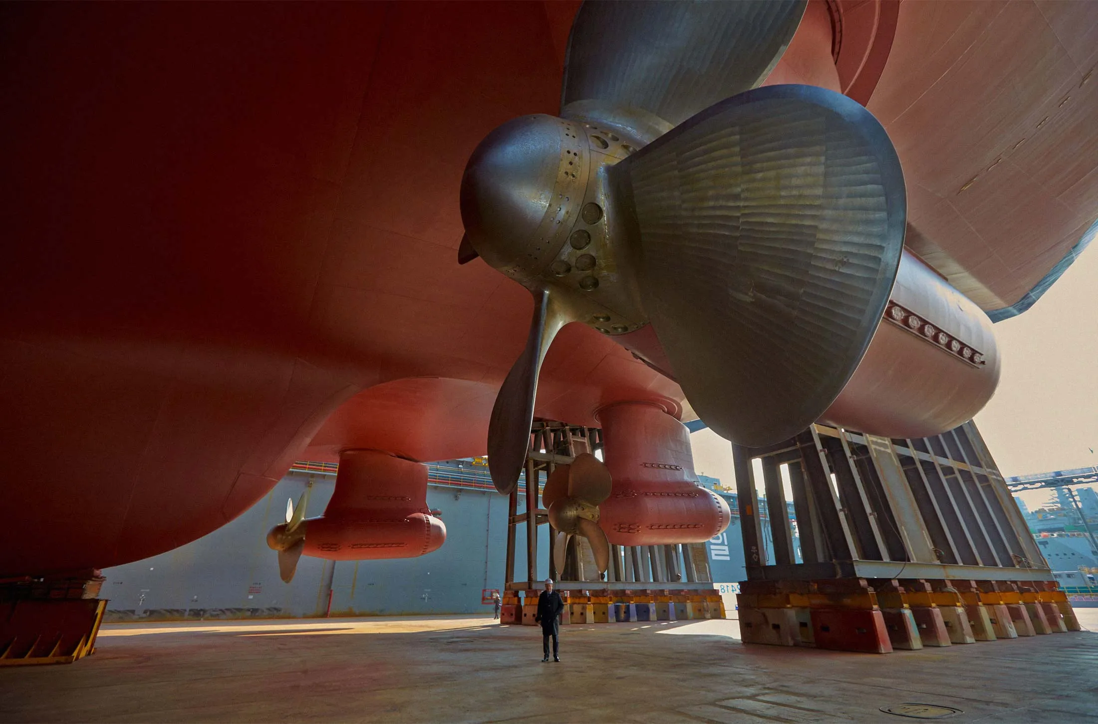 Sergey Frank, CEO of Russian shipping company Sovcomflot, stands beneath the Christophe de Margerie, the first ship in a new LNG icebreaker fleet.